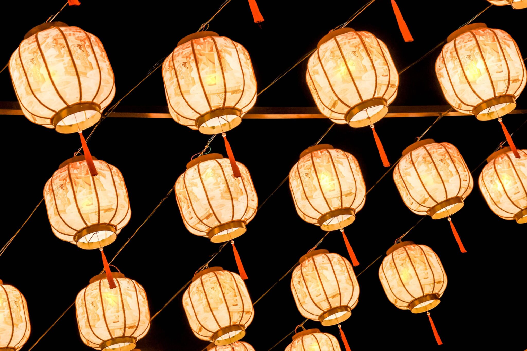 Festive night lanterns illuminating the sky — evoking the spirit of the Tanabata Sky Lantern Festival in Kyoto